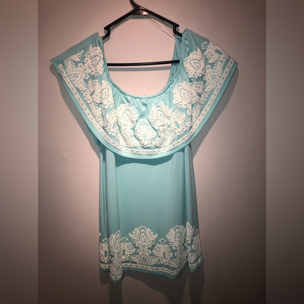 Off the shoulder teal/mint top with off white design